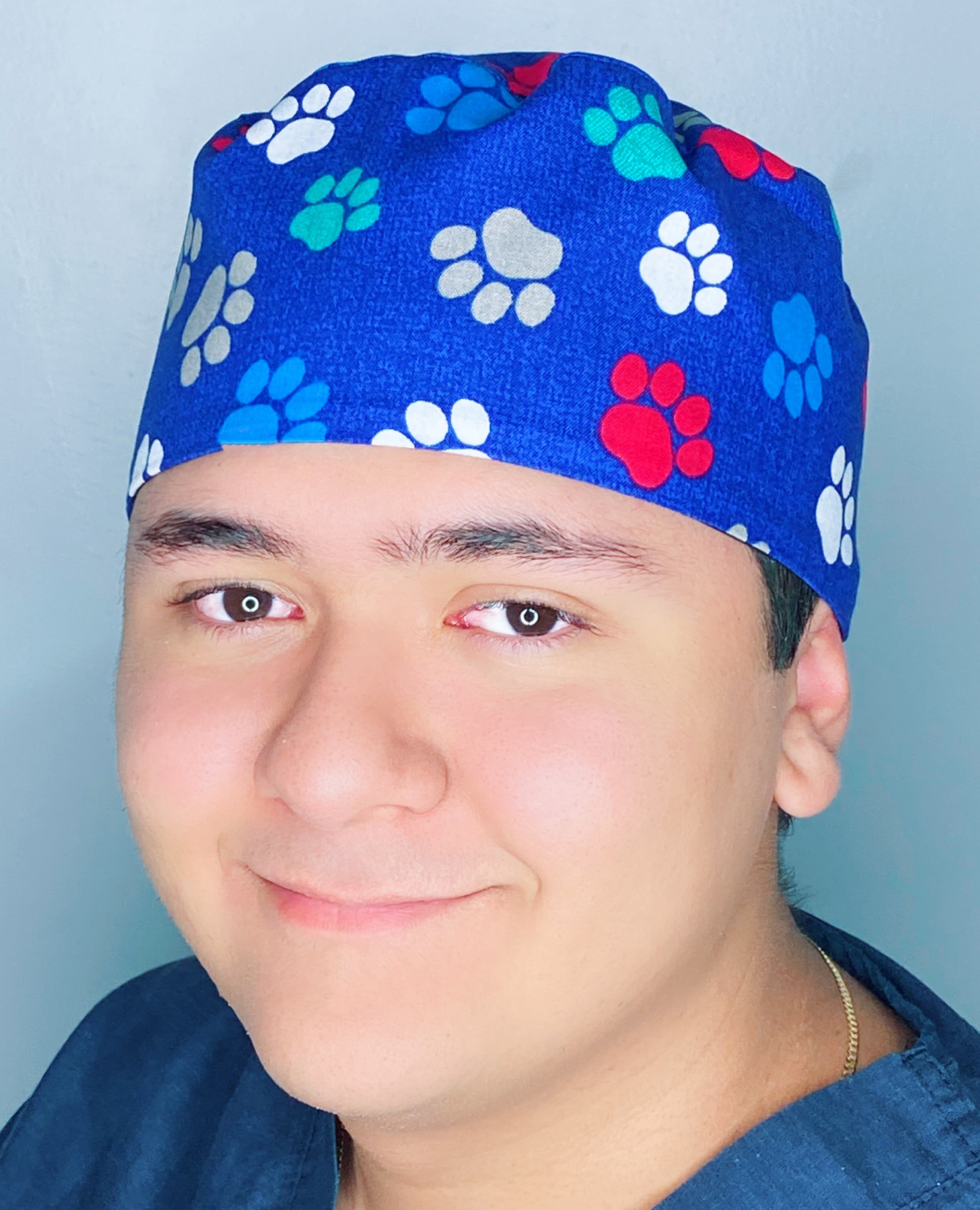 Colorful Paw Prints on Royal Blue Unisex Animal Scrub Cap