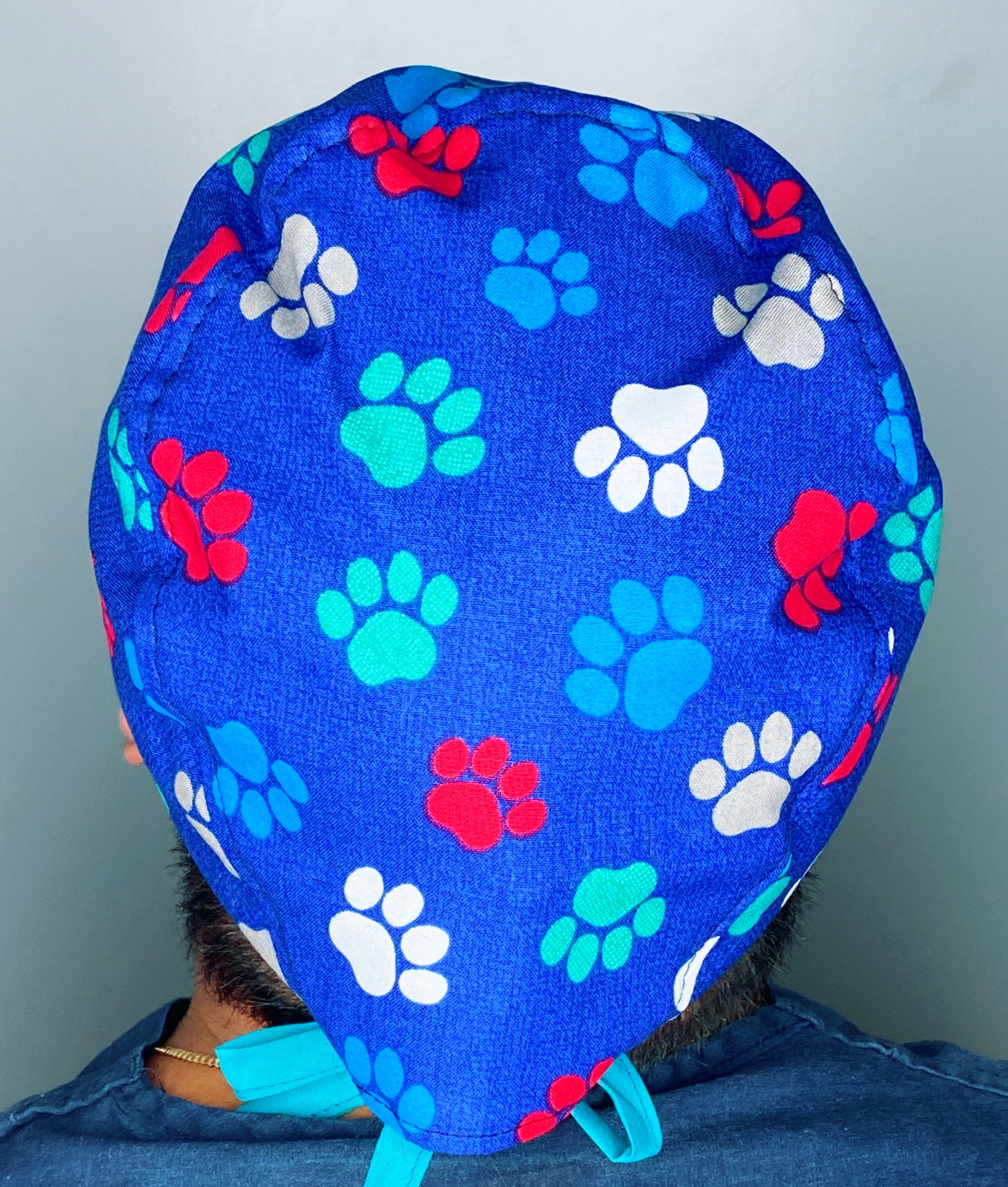 Colorful Paw Prints on Royal Blue Unisex Animal Scrub Cap