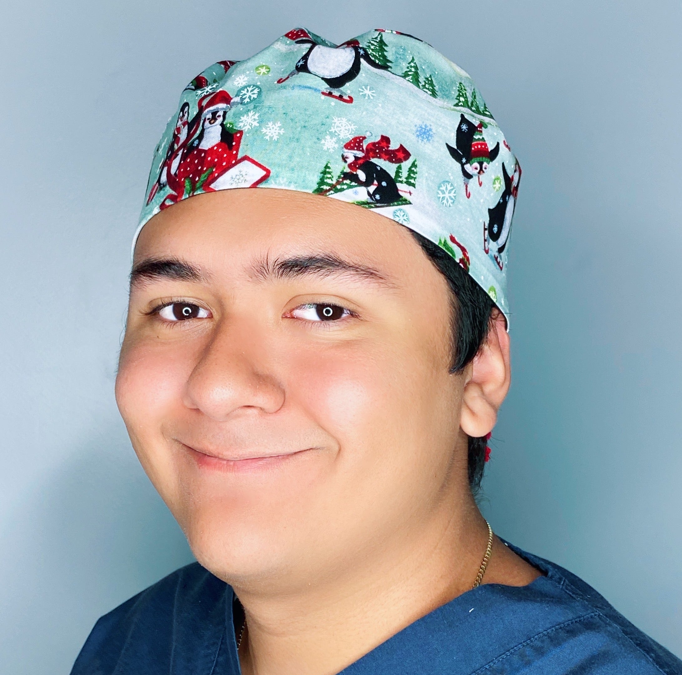 Cute Penguins in Snow Christmas/Winter themed Unisex Holiday Scrub Cap