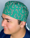 Candy Canes on Green Christmas/Winter themed Unisex Holiday Scrub Cap