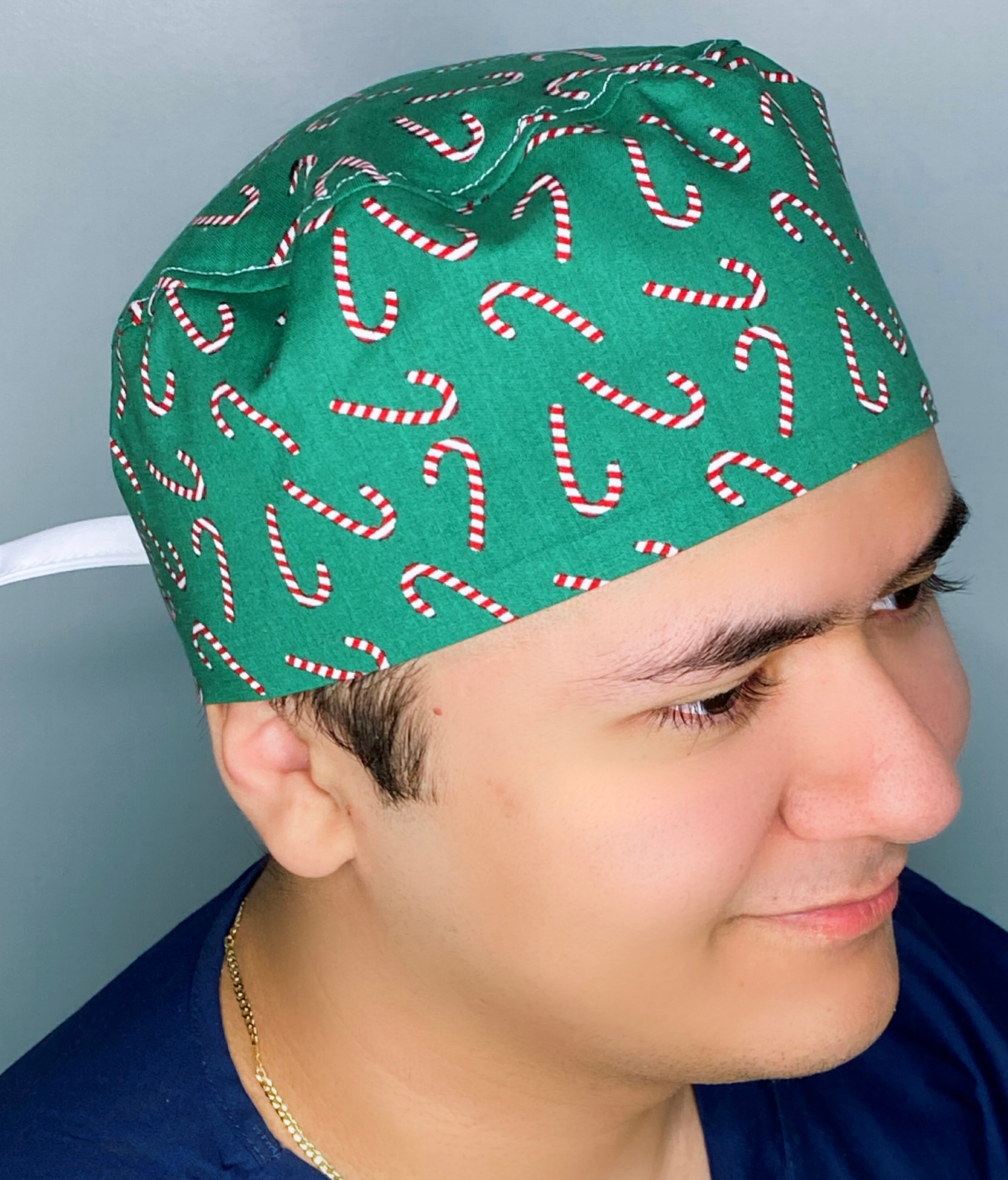 Candy Canes on Green Christmas/Winter themed Unisex Holiday Scrub Cap