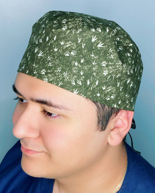 Dinosaurs Foot Prints on Hunter Green Unisex Animal Scrub Cap