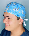 Pups Paws & Bones on Blue Unisex Animal Scrub Cap