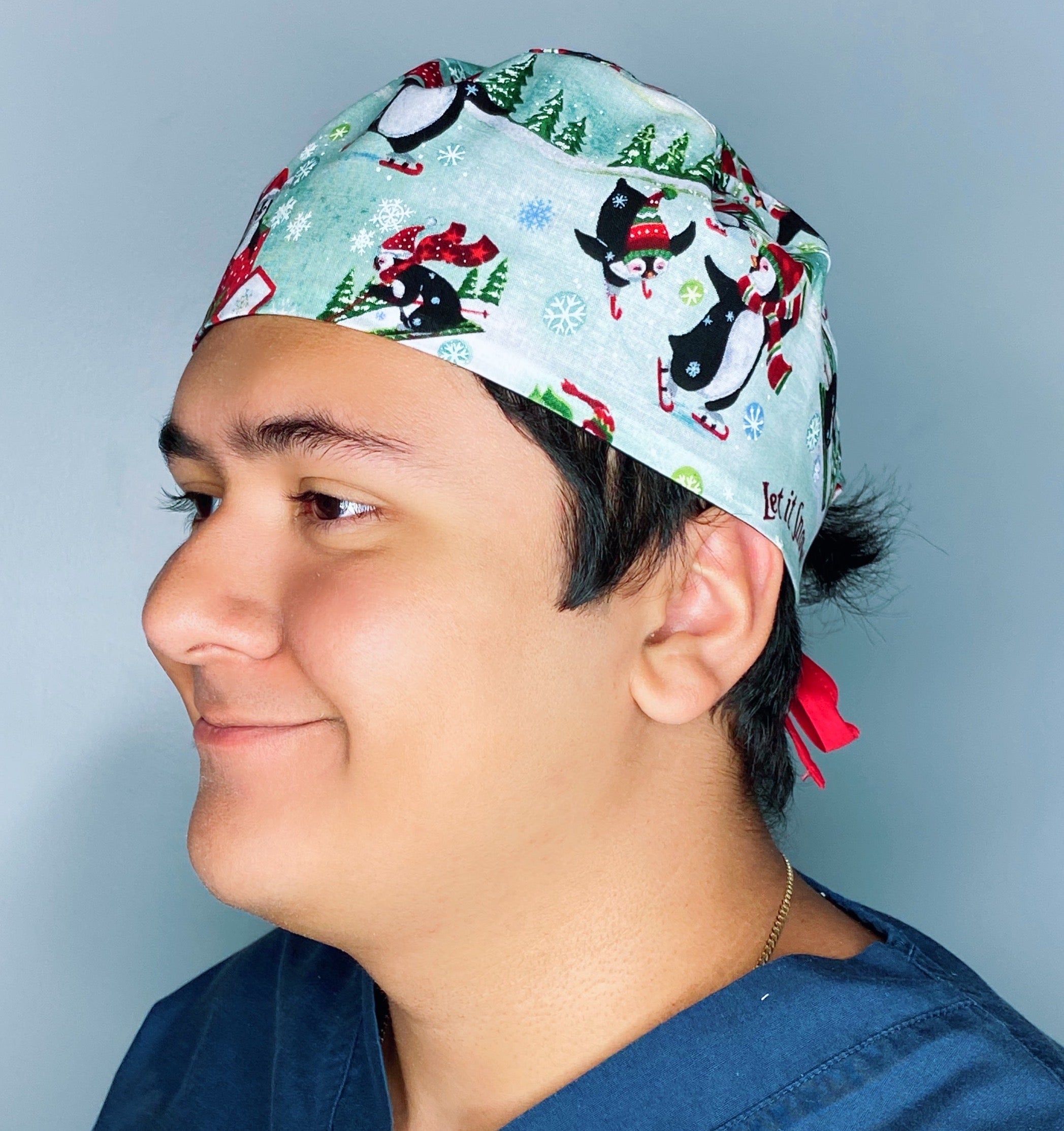Cute Penguins in Snow Christmas/Winter themed Unisex Holiday Scrub Cap